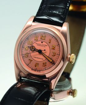 Rare Rolex Circa 1945, Ref.3696 32mm Oyster Perpetual Chronometer Self-winding "Bubble-back" Tropical in 9KRG 3pc case