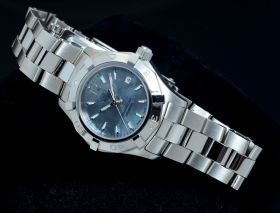 Tag Heuer, 27mm lady's "Aquaracer" 300m Ref.WAF1417 quartz+date in Steel with Pearl dial