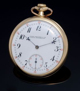 C.1916 Patek Philippe & Cie, Geneva 47mm Open Face pocket watch with white enamelled dial & Fleur de Lis hands in 18KYG