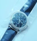 Patek Philippe Ref.5147G-001, 39mm "Calatrava Annual Calendar Moonphase" on black dial with diamond bezel in 18KWG