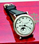 Patek Philippe, 36mm "Moonphase, date & power reserve" Ref.5054G-001 in 18KWG