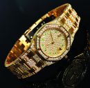 Audemars Piguet 24mm Lady's Ultra-slim Royal Oak 66335BA.ZZ.0722BA.05 in 18KYG with original pavé Diamonds & Emeralds