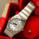 Omega 27mm "Ladys Constellation" Ref.12310276055001 with 12 diamonds on Pearl dial in Steel