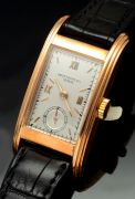 Patek Philippe & Co., Genève C.1941 Ref.514 Long rectangular & curved case with stepped sides in 18KPG