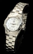 Tag Heuer, 28mm lady's "Aquaracer" 300m Ref.WAF1415 quartz+date in Steel with diamonds