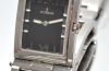 Corum "Tabogan" Ref.56-151-20 manual winding with folding assymetrical case in Steel