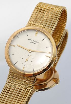 Patek Philippe, C.1960s 33mm "Calatrava" in 18KYG