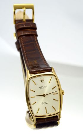 Rolex, Circa 1970s "Cellini Tonneau" Ref.3807 manual wind in 18KYG