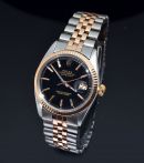 1965 Rolex, 36mm Rare Oyster Perpetual "Datejust" Chronometer Ref.1601 Black lacquered gilt dial in 14K Pink Gold and Steel. B&P