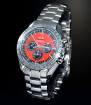 2010 Unused Omega, 42mm "Speedmaster Michael Schumacher, The Legend" auto/date Chronograph Ref.35066100 Red dial in Steel. F/Set