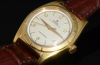 C.1950 Rare Rolex 32mm Oyster Perpetual Chronometer Bubbleback Ref.5011 with engine turned bezel in 18KYG