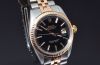 1965 Rolex, 36mm Rare Oyster Perpetual "Datejust" Chronometer Ref.1601 Black lacquered gilt dial in 14K Pink Gold and Steel. B&P